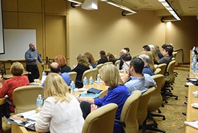 Attendees listen to a speaker in on of the education sessions.