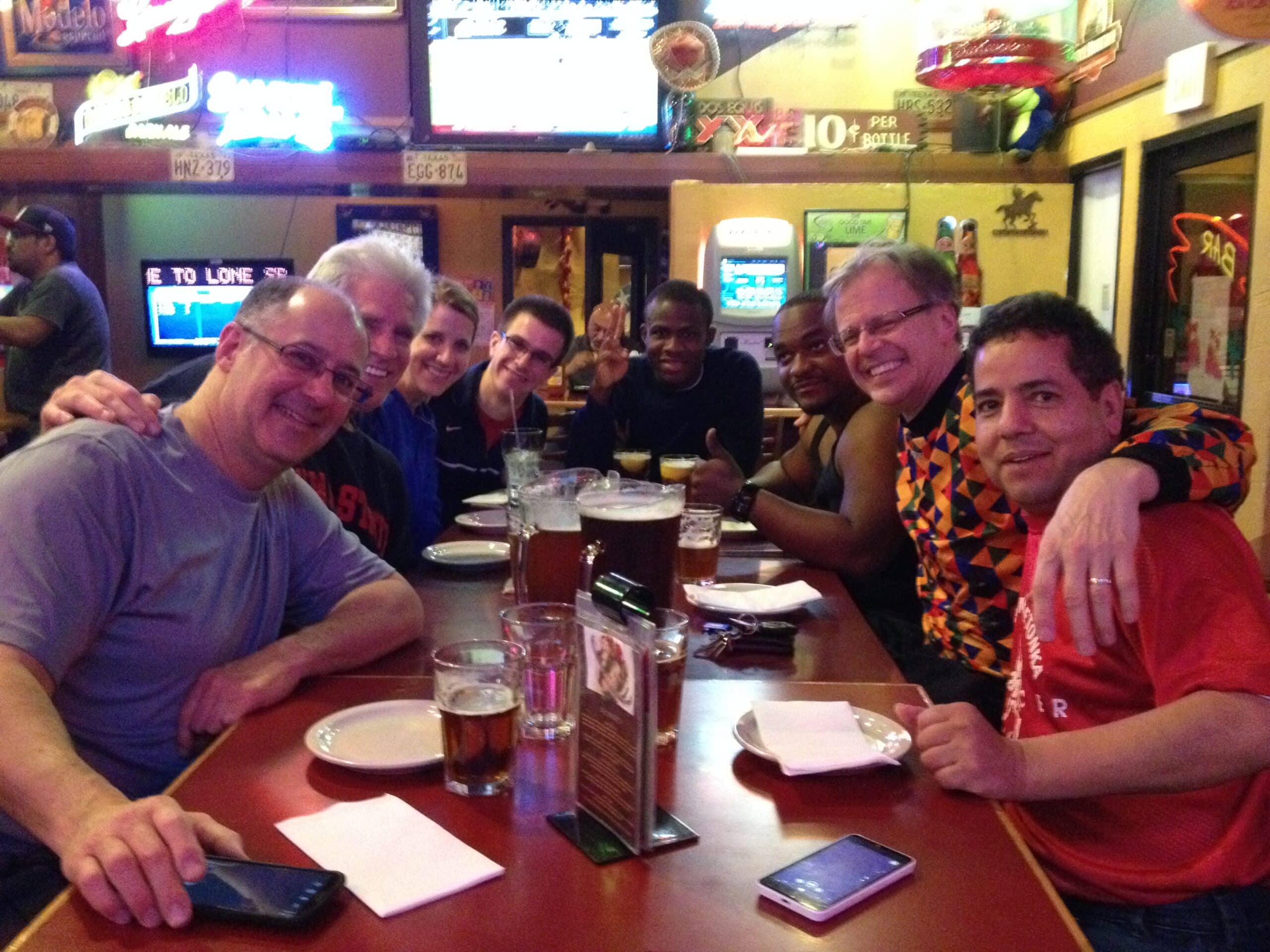 Joe with soccer teammates at dinner.