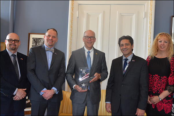 Rep.Walden (center) met with (from left) Dan Reading; Tom Goos, MAS; Paul Bellantone, CAE; and Dani Smith, CAS, for his Legislator of the Year presentation on Wednesday.