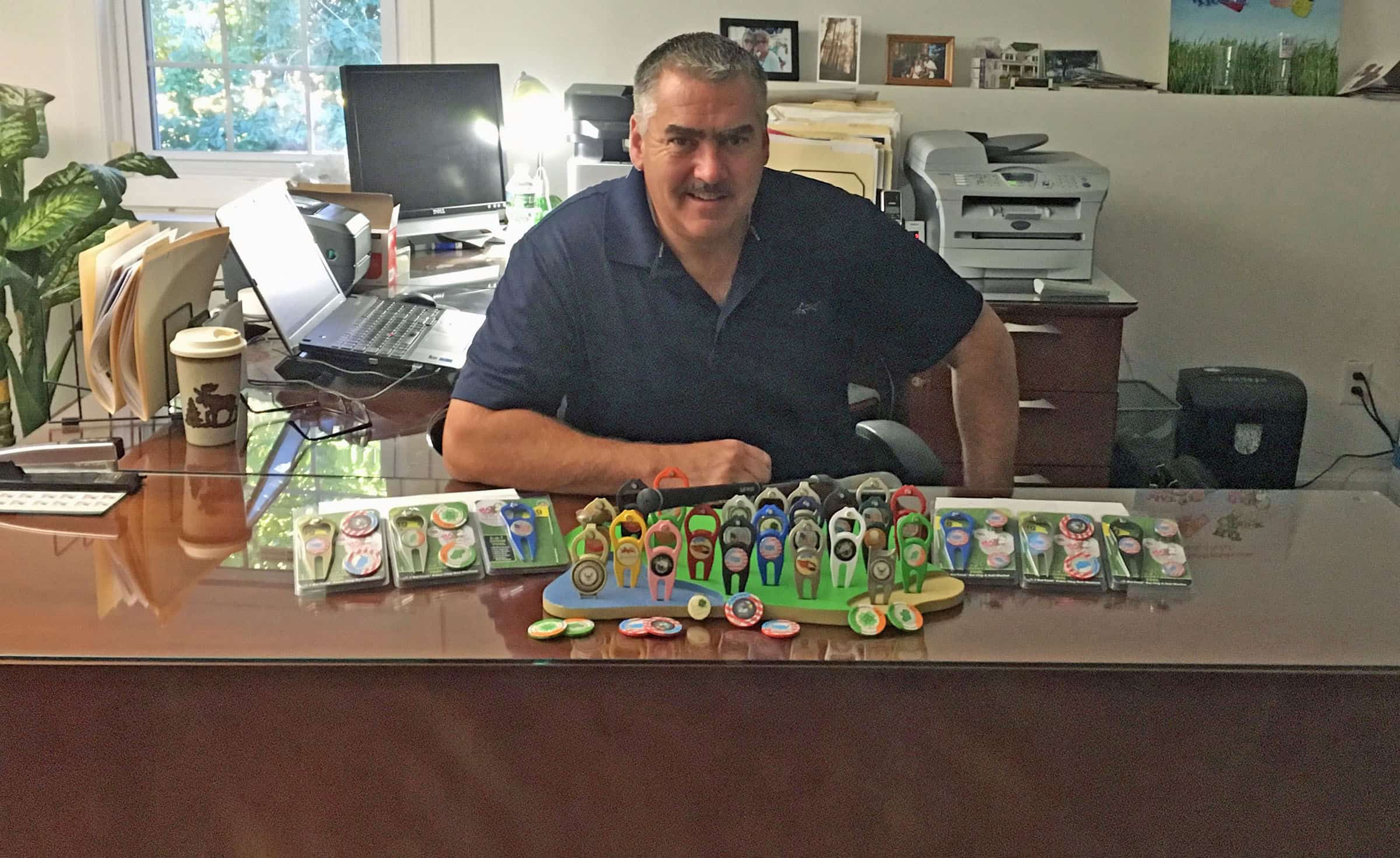 Rick Beard in his home office with a selection of his company’s USA-made products.