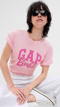 woman wearing pink Gap Barbie logo T-shirt