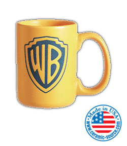 yellow ceramic mug with Warner Bros. logo etched in blue with puffy effect and made in USA sticker on the bottom