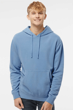 teen model wearing a dusty blue pigment-dyed hoodie