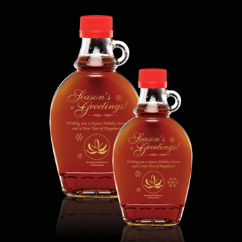 custom-etched leaf-shaped bottles of 100% Pure Canadian Maple Syrup by St Regis Group