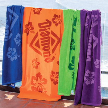 brightly decorated beach towels