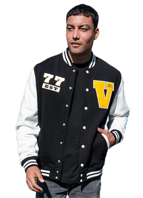 young man wearing black and white varsity letter jacket