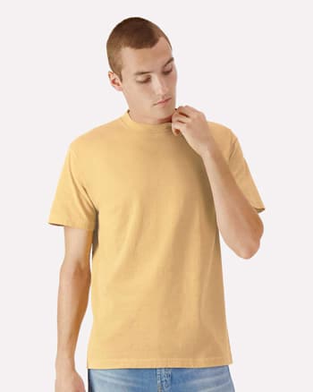 man wearing mustard-colored American Apparel Garment-Dyed Heavyweight Cotton Tee