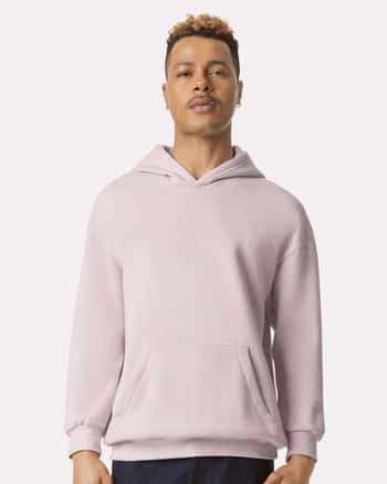 man wearing cream-colored hoodie by American Apparel